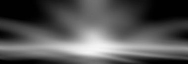 Ürün montajı veya sanat çalışması için sahne ışığı arkaplanı olan siyah stüdyo odası.