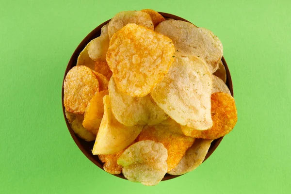 Potato Chips Clay Bowl Isolated Light Green Background Top View — Stock Photo, Image