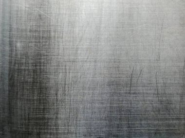 Stainless steel large sheet  With light hitting the surface  For background,Inside passenger elevator,Reflection of light on a shiny metal surface,stainless steel background.