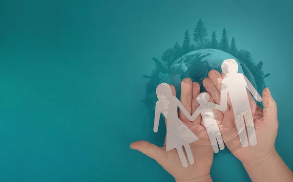 Family with planet earth as silhouette, environment concept, connect and protect to nature, global world, earth day