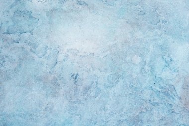 Textured blue colored background, scratched wall structure, template for scrapbook, vintage style 