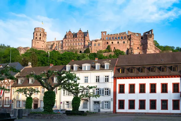 stock image Heidelberg, mediaevial castle, red sandstone ruins tower looms majestically over the Neckar river and valley, 01.05.2024