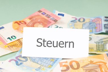 Tax, german lanuage, taxation law, deadline for payment, financial income, business taxes, euro banknotes, paying money to state