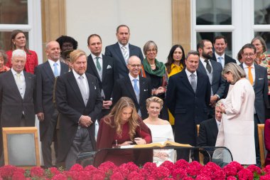 Princess Amalia of Netherlands signing book, celebration of throne accession of Grand Duke Guillaume, Luxembourg city, october 3rd 2025