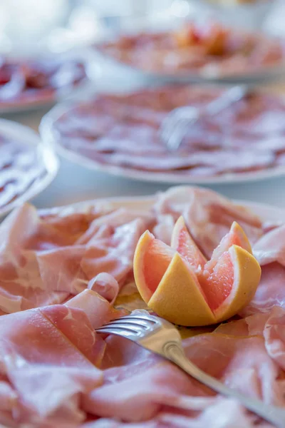 Plate Cooked Ham Orange Decoration Party Holiday Defocused Background — Stock Photo, Image