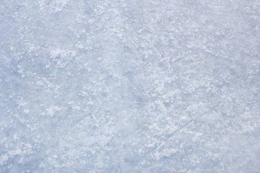 Buz üstünde buz pateni ve hokey izleri, mavi doku..