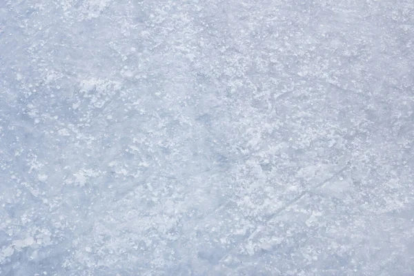 冰的背景 有滑冰和曲棍球的痕迹 蓝色的纹理 — 图库照片