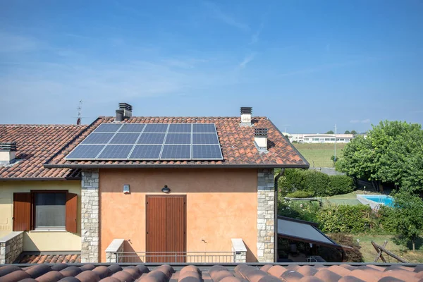 Solar panels on roof home. Ecology. Modernity. Economy. New technology. Copy Space.