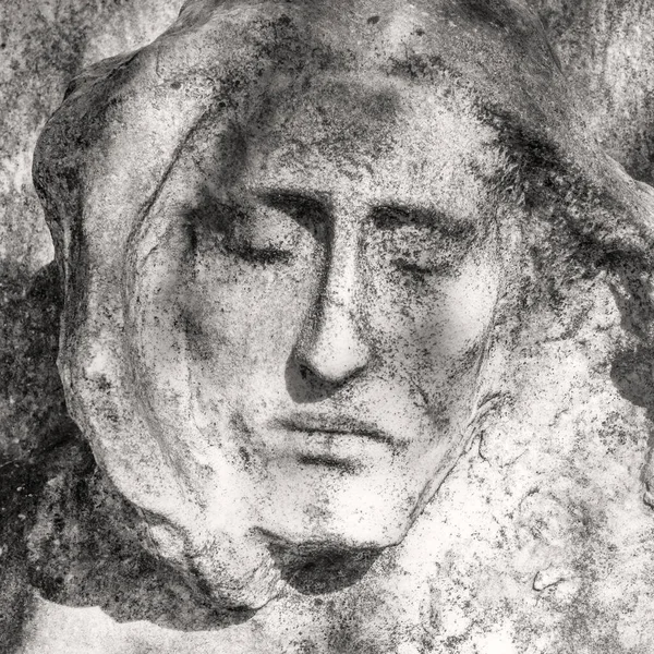 Portrait photo of Jesus Christ statue. Unbearable pain in mind.