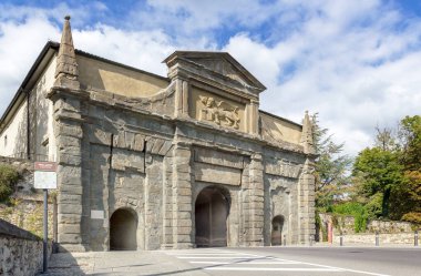 Sant'Agostino gate Porta SantAgostino is the main entrance to the Upper Town (Citta alta) and has the Lion of Saint Mark sculpted. European travel and historical and cultural tourism.. Bergamo, ITALY - January 5, 2024 clipart