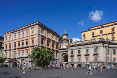 Naples, Italy. View of Piazza Dante with the ancient Port'Alba gate on the left. 2022-08-20.