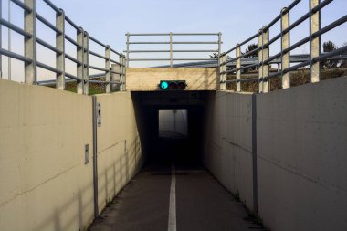 Entrance of a passageway under a highway