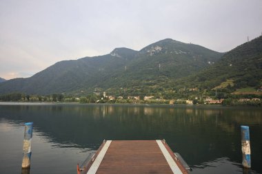 Pier on a lake at sunset