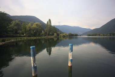 Pier on a lake at sunset