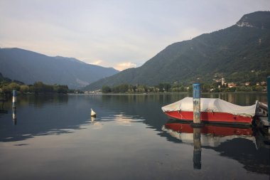Pier on a lake at sunset