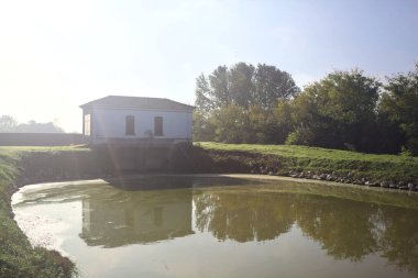 Historic weir over a channel clipart