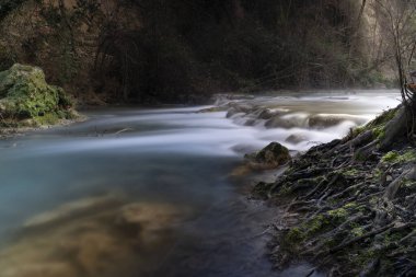 tuscany waterfalls produced by the elsa river and roots in evidence