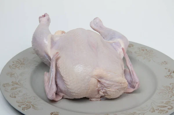 stock image raw whole chicken on the table