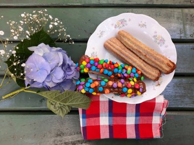 delicious gourmet churros on the table