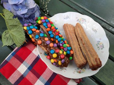 delicious gourmet churros on the table