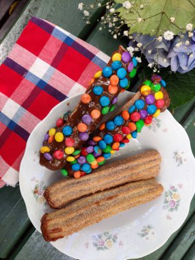 delicious gourmet churros on the table