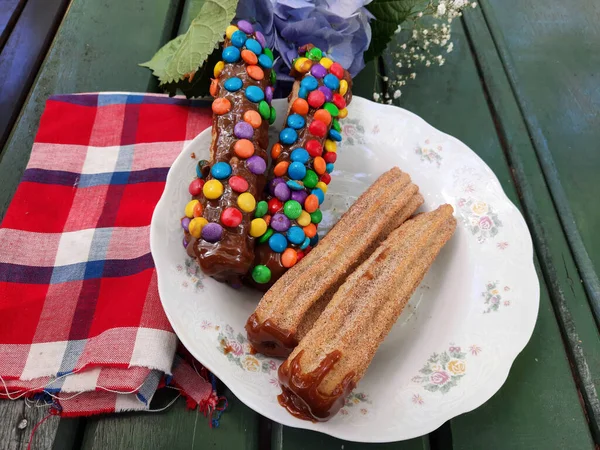 delicious gourmet churros on the table