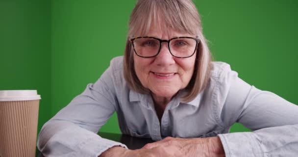 Close Lovely Senior Woman Video Chatting Indoors Greenscreen Studio Backdrop — Stock Video