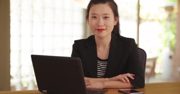 Portrait Female Asian Business Worker Sitting Table Laptop Mobile Device — Stock Video