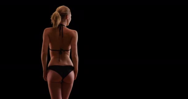 Rear View Happy Woman Swimsuit Black Background Copy Space Smiling — Stock Video