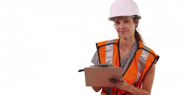 Happy Female Construction Worker Hardhat Safety Vest Writing Clipboard Smiling — Stock Video