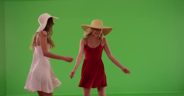 Young Beautiful Girls Having Good Time Spinning Dresses Green Screen — Stock Video