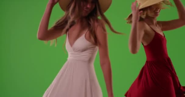 Young Beautiful Girls Having Good Time Spinning Dresses Green Screen — Stock Video