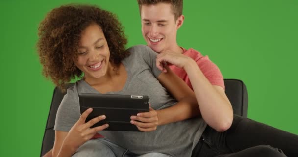 Close Multiracial Couple Using Tablet Computer Look Online Green Screen — Stock Video