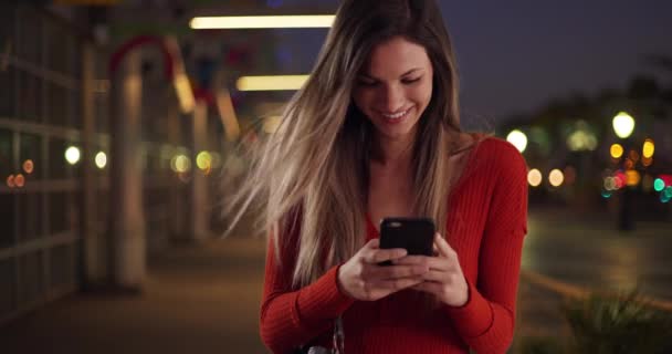 Millennial Woman Texting Smartphone Looking Happy Street Evening Caucasian Girl — Stock Video