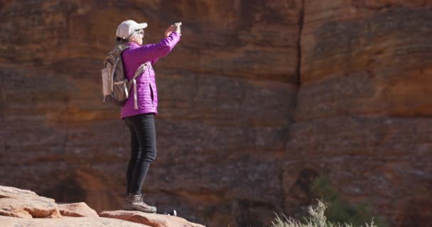 Happy Senior Female Hiker Using Smartphone Camera Take Pictures Nature — Stock Video