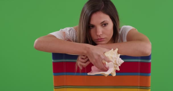 Bored Sad Young Woman Holding Conch Shell Beach Chair She — Stock Video
