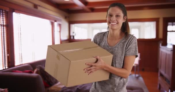 Joyful Young Woman Home Tossing Shipping Box Air Pretty Brunette — Stock Video