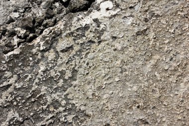 Taş yüzeyin arka plan dokusu. Yakın planda bir taşın pürüzlü yüzeyi. 