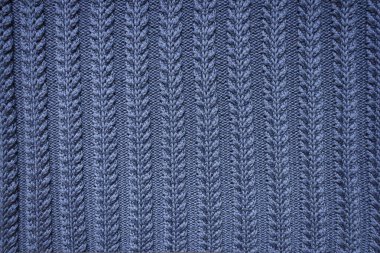 Mavi arkaplan dokusu örülmüş kumaş. Rahatlama örgü deseni yakın çekim