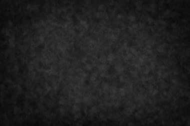 Suluboya lekeleri ve lekeleri olan siyah soyut arkaplan duvar kağıdı