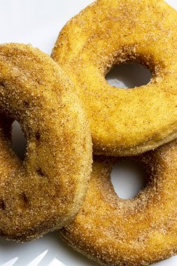 Cinnamon donut filled with apricot jam.