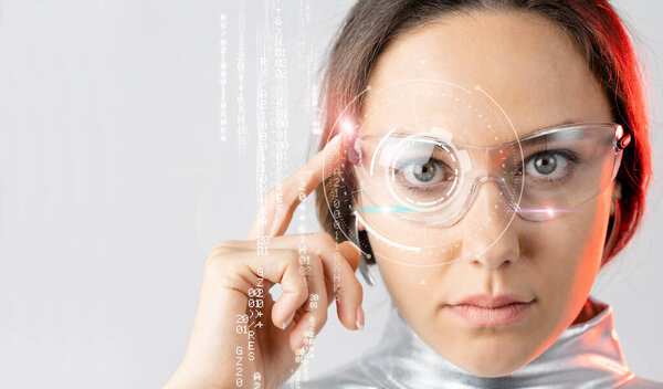 Young woman wear hi-tech smart glasses smart technology. Business investment graph chart futuristic virtual hologram, financial report data management augmented reality technology