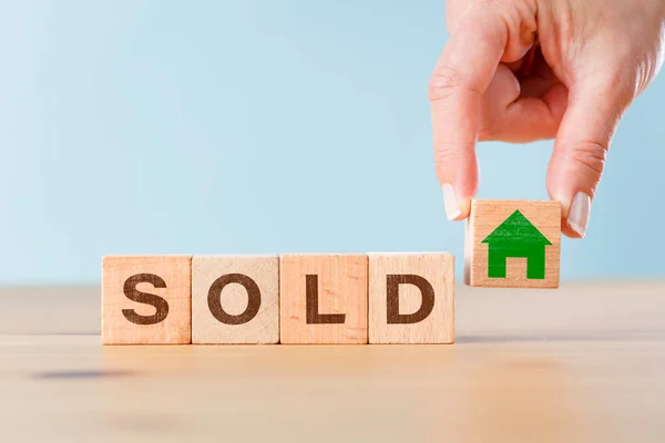 Woman Hand Holding Wood Cube Icon House Word Sold Property — Stock Photo, Image