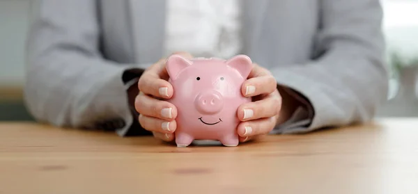 Woman Hand Holding Piggy Bank Wooden Table Saving Money Financial — Stock Photo, Image
