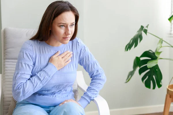 Young Woman Suffering Chest Pain Touching Her Hear — Stock Photo, Image