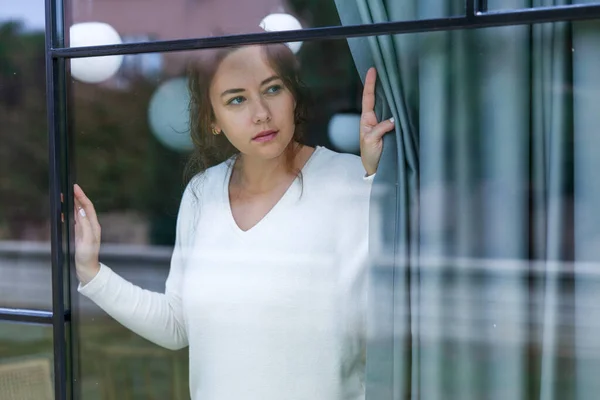 Thoughtful Young Woman Looking Out Window Home — Stock Photo, Image