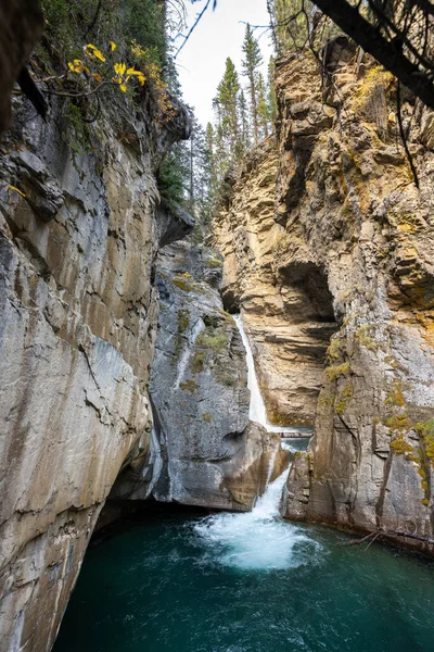 stock image wide shot of johnston canyon lower falls from the lower bridge