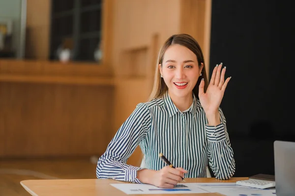 stock image asian girl Work on laptop at work Small Business Startup Online Banking Tax Accounting Financial Concepts