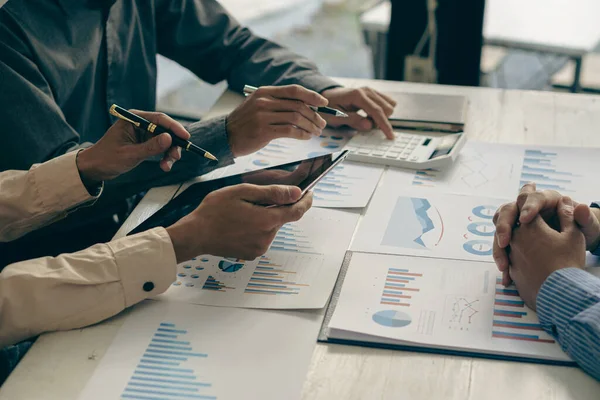 stock image Accounting Concepts Asia Business Consultants meeting to analyze and discuss the situation regarding financial reports in the conference room. investment advisor