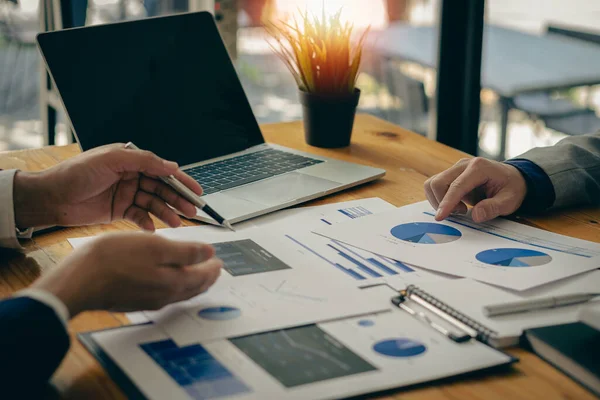 stock image Accounting Concepts Asia Business Consultants meeting to analyze and discuss the situation regarding financial reports in the conference room. investment advisor